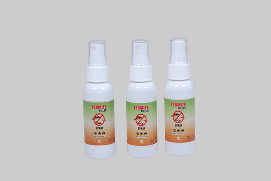 Three bottles of termite killer spray on a white background
